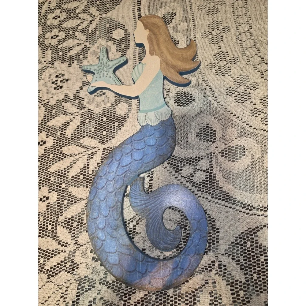 wooden mermaid wall decor features a coastal-inspired blue tail W/ brown Hair